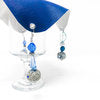 royal blue drink cover with crystals and a straw hole on top